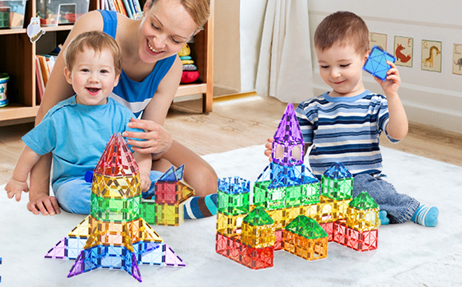 Kids are Playing with Magnetic Tiles Toys on the Floor