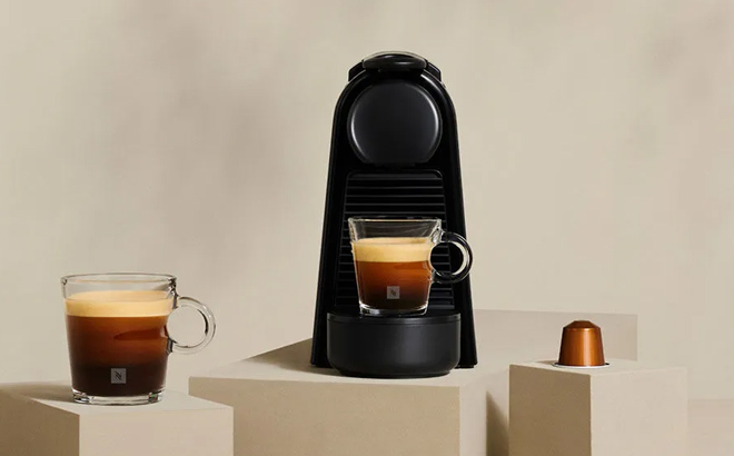 Nespresso Essenza Mini Coffee Machine on a Product Display Stand