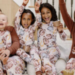 People wearing Burts Bees Baby Football Season Matching Family Pajamas