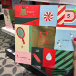 Person Holding Skincare Advent Calendar 12 Piece Gift Set