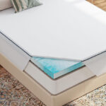 Queen 3 Inch Cooling Mattress Topper on a Bed