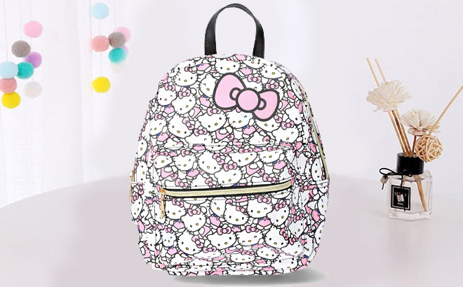 Sanrio Hello Kitty All Over Print PU Mini Backpack on a Table