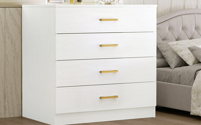 White 4 Drawer Wood Dresser in the Bedroom