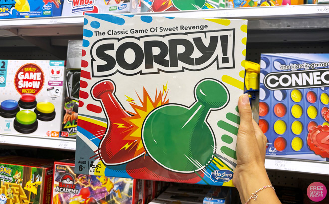 a Person Holding Hasbro Classic Sorry Board Game