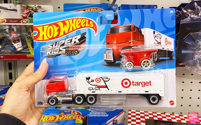 a Person Holding Hot Wheels Target Bullseye Big Rig Vehicle