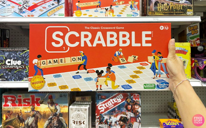 a Person Holding Scrabble Classic Board Game