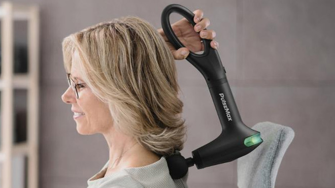 a Person Using PulseMax Portable Massage Handheld Gun