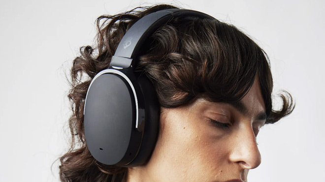 a Person Wearing Skullcandy Hesh Noise Canceling Wireless Headphones