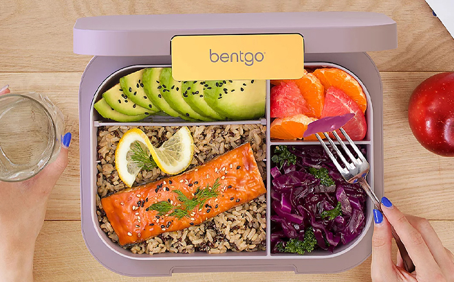 A Bentgo Lunch Box in Orchid Color with Food in it