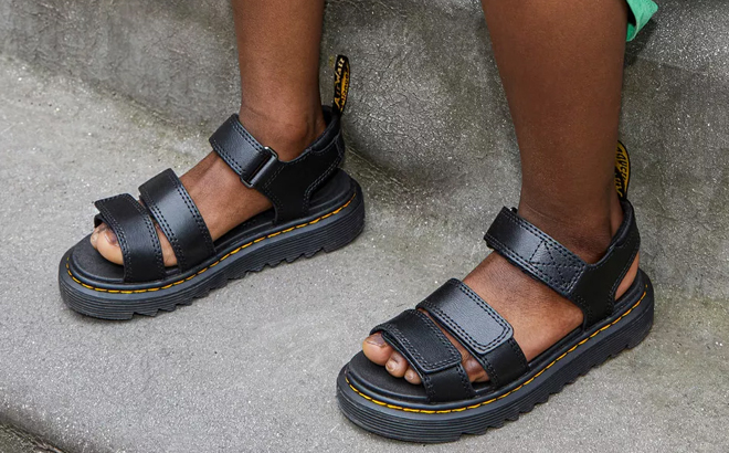 A Boy Wearing Dr Martens Klaire Sandals