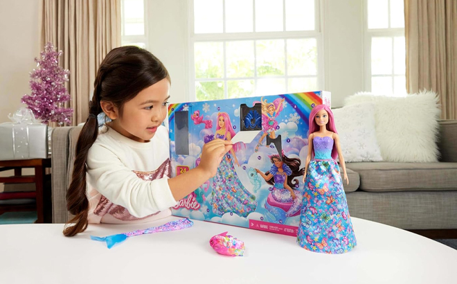 A Girl Playing with the Barbie Advent Calendar