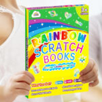 A Kid Holding a Rainbow Scratch Notebook