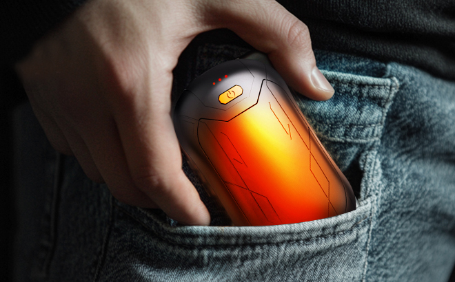 A Man Holding Crazysoul Rechargeable Hand Warmer