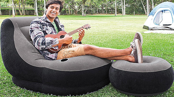 A Man Lounging on the Intex Inflatable Ultra Lounge with Ottoman