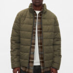 A Man Wearing GAP Factory ColdControl Relaxed Puffer Jacket