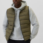 A Man Wearing GAP Factory ColdControl Relaxed Puffer Vest