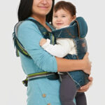 A Mother Using a Monbebe 5 in 1 Baby Carrier