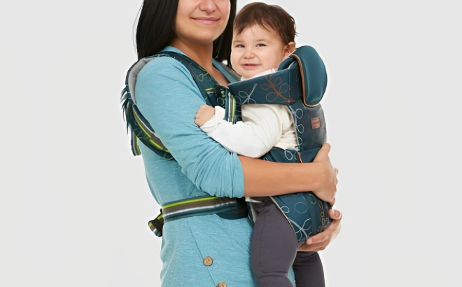 A Mother Using a Monbebe 5 in 1 Baby Carrier