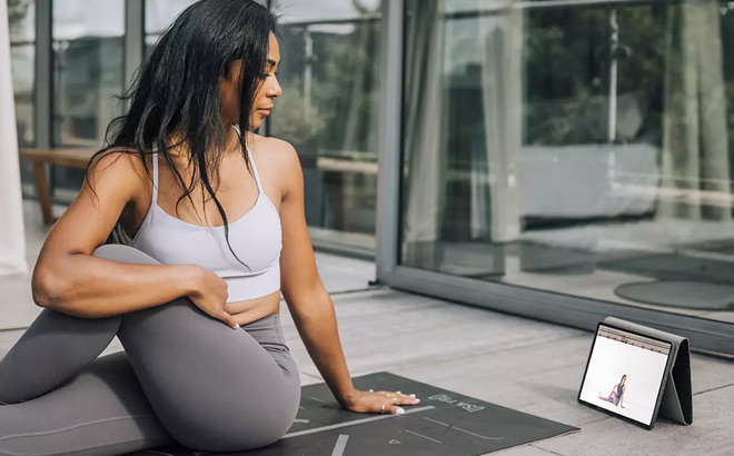 A Person Attending an Online Yoga Class