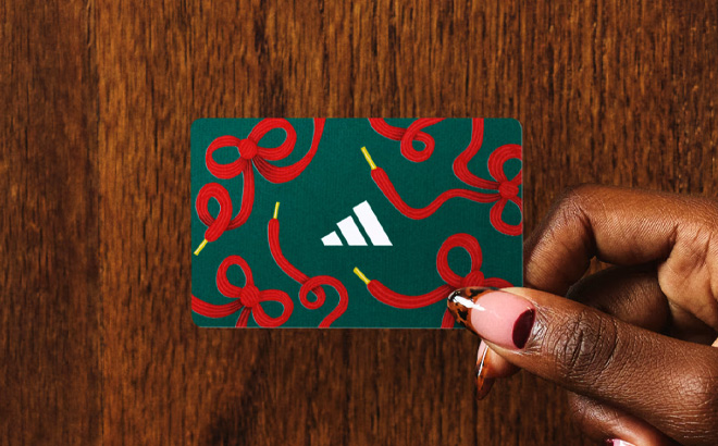 A Person Holding Adidas Gift Card