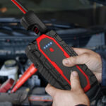 A Person Holding Nusican Car Jump Starter