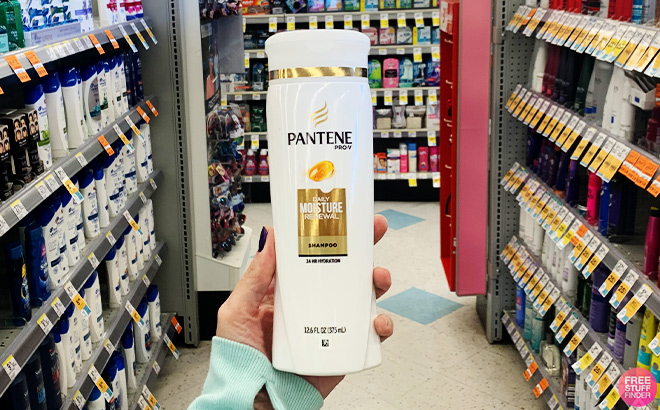 A Person Holding Pantene Daily Moisture Renewal 72 Hour Lush Moisture Shampoo