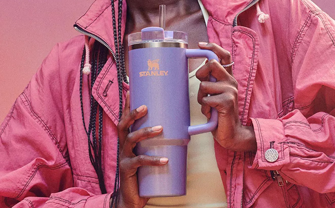 A Person Holding Stanley 40 oz Quencher H2 0 FlowState Tumbler from New Frequency Collection