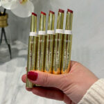 A Person Holding a 5 Piece Tarte Maracuja Juicy Lipstick Set