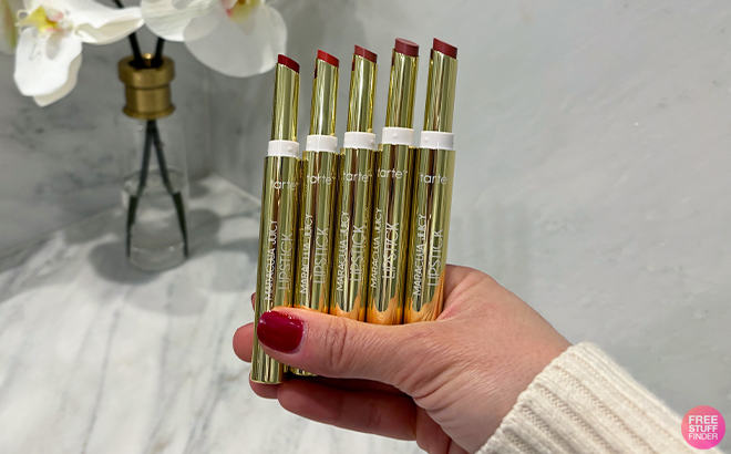 A Person Holding a 5 Piece Tarte Maracuja Juicy Lipstick Set