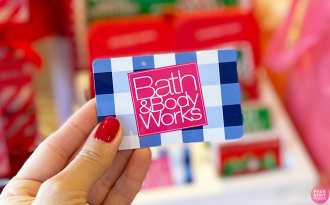 A Person Holding a Bath Body Works Gift Card