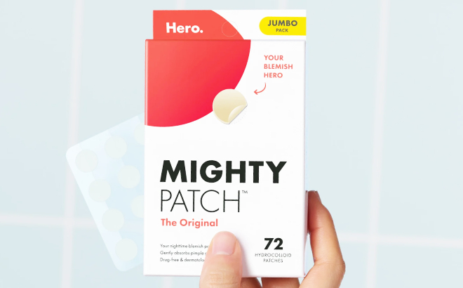 A Person Holding a Box of Hero Mighty Patch