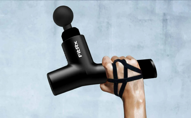 A Person Holding a FitRx Massage Gun