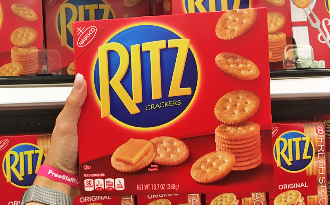 A Person Holding a Ritz Crackers Pack