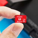 A Person Holding a SanDisk Nintendo Switch 128GB microSDXC Card