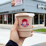 A Person Holding a Wendys Choco Frosty