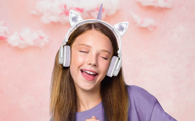 A Person Wearing ARTSOUND LED Light Up Unicorn Bluetooth Wireless Headphones