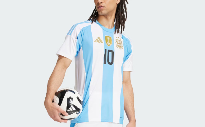 A Person Wearing Adidas Argentina 24 Messi Home Jersey