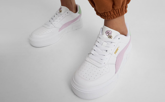 A Person Wearing Puma Cali Court New Bloom Womens Sneakers