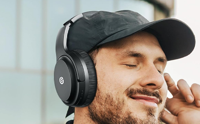 A Person Wearing the Falebare Bluetooth Headphones Over Ear