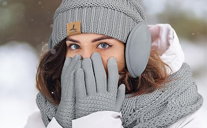 A Person Wearing the Winter Hat Scarf Gloves and Ear Warmer Set