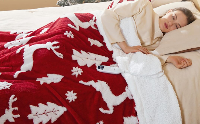 A Person covered with Bedsure Christmas Heated Blanket