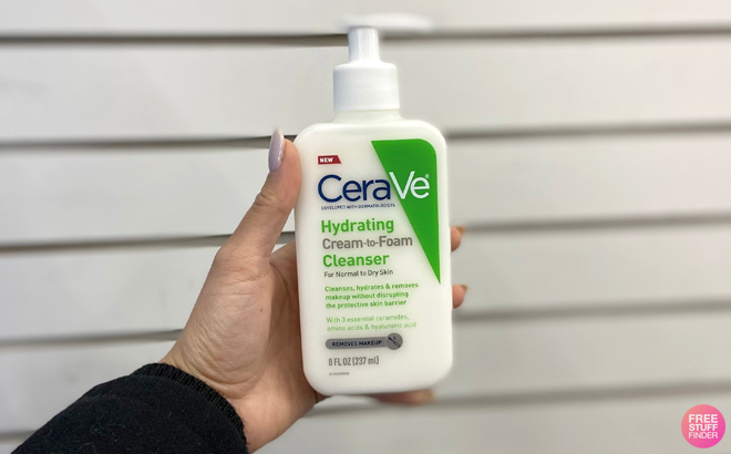 A Woman Holding CeraVe Hydrating Cream to Foam Cleanser