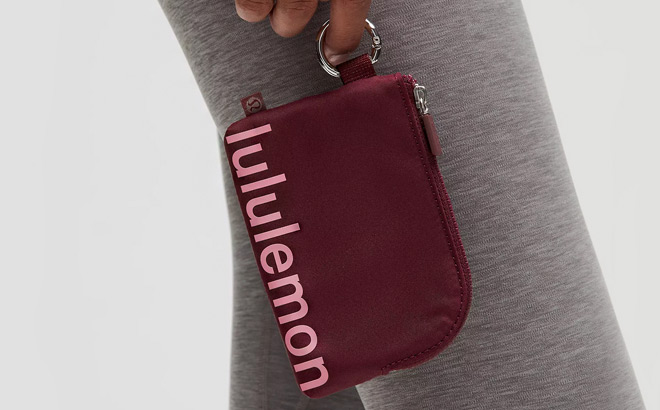 A Woman Holding Lululemon Clippable Card Pouch