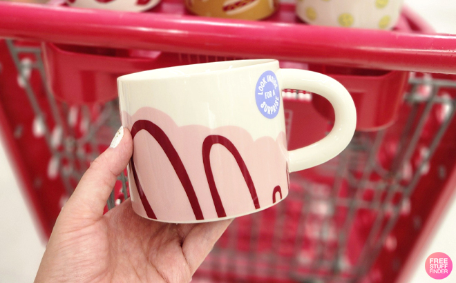 A Woman Holding Room Essentials Stoneware Donut Mug