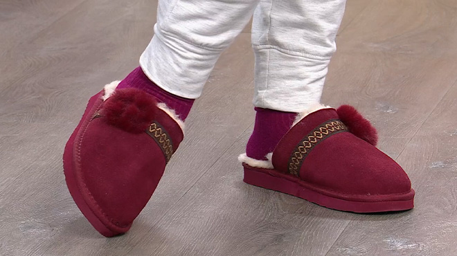 A Woman Wearing Bearpaw Linda Suede Slippers