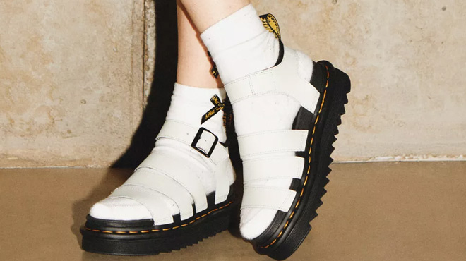 A Woman Wearing Dr. Martens Blaire Platform Sandals