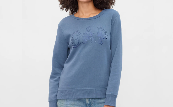 A Woman Wearing GAP Factory Relaxed Western Gap Logo Sweatshirt