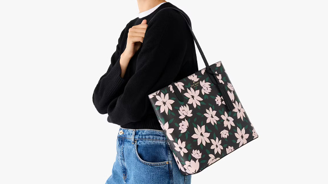 A Woman Wearing Kate Spade Outlet Jana Winter Blooms Medium Tote