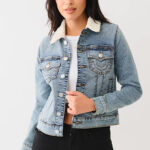 A Woman Wearing True Religion Sherpa Collar Trucker Denim Jacket