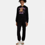 A girl wearing a No Boundaries Graphic Hoodie Jogger Pants Set